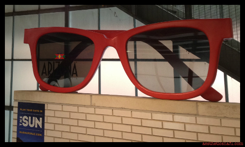 giant sunglasses advertising Arizona at CTA Station