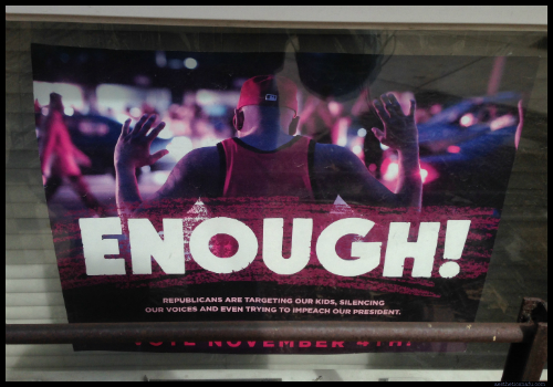 Enough poster in Chicago window saying Republicans are racist