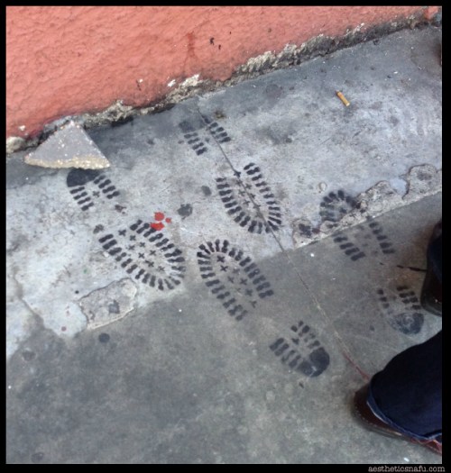 Bootprint sidewalk grafitti by Jermy Nova, New Orleans.